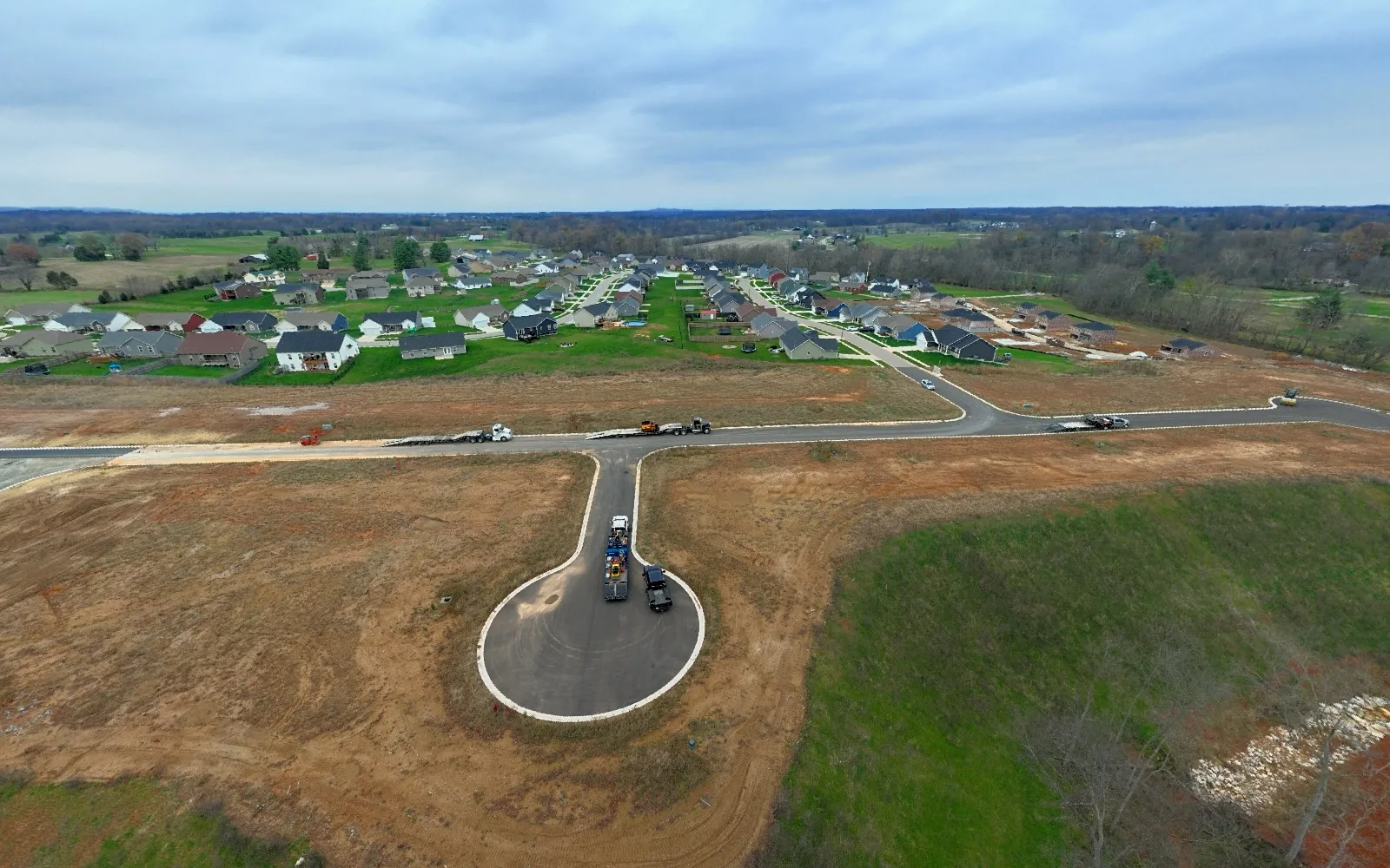 November 2024 — Paving extends through the development while finished lots are stabilized for vertical construction.