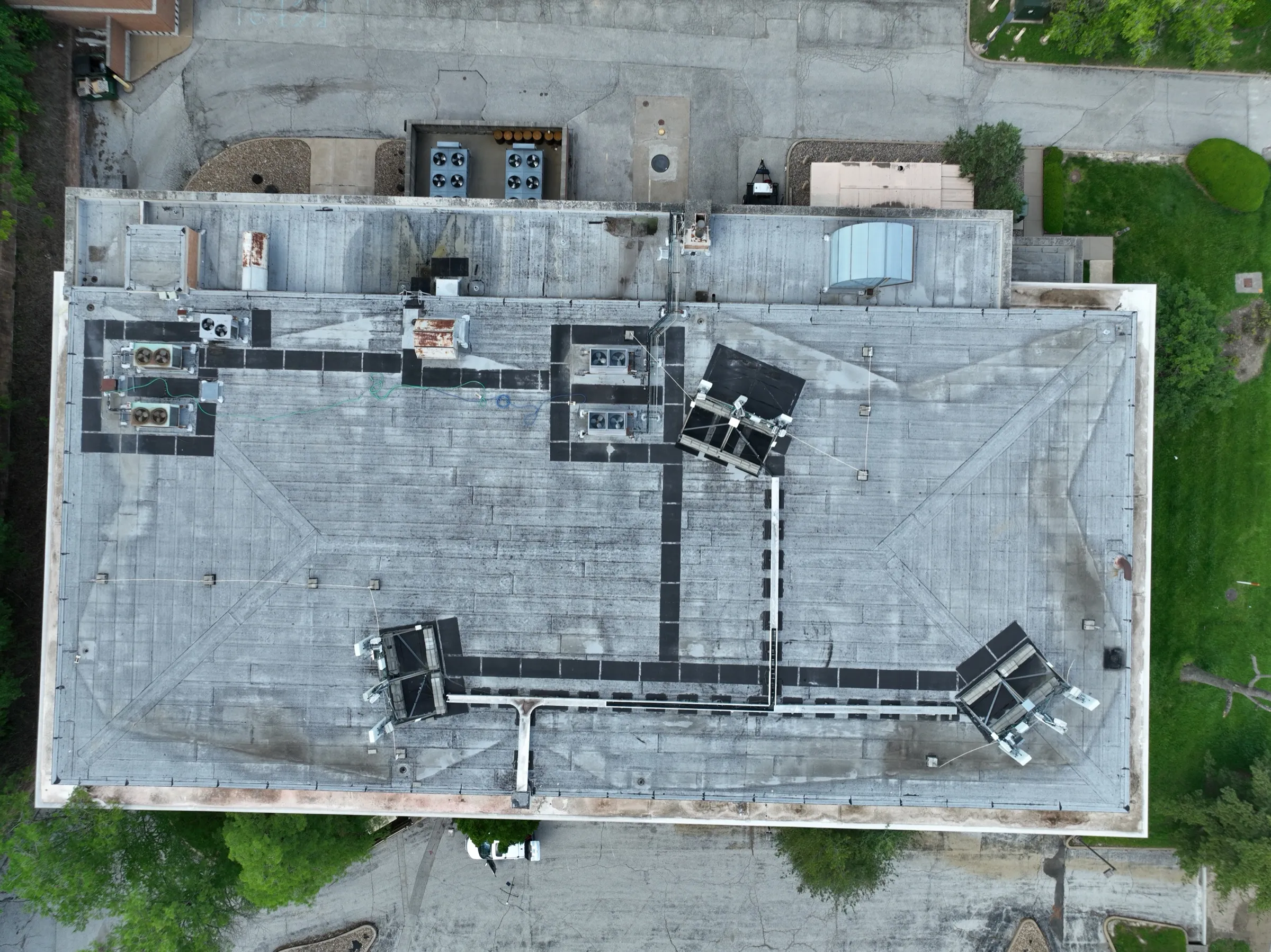 Rooftop context — vertical coverage records equipment placement, roof penetrations, support framing and access paths.